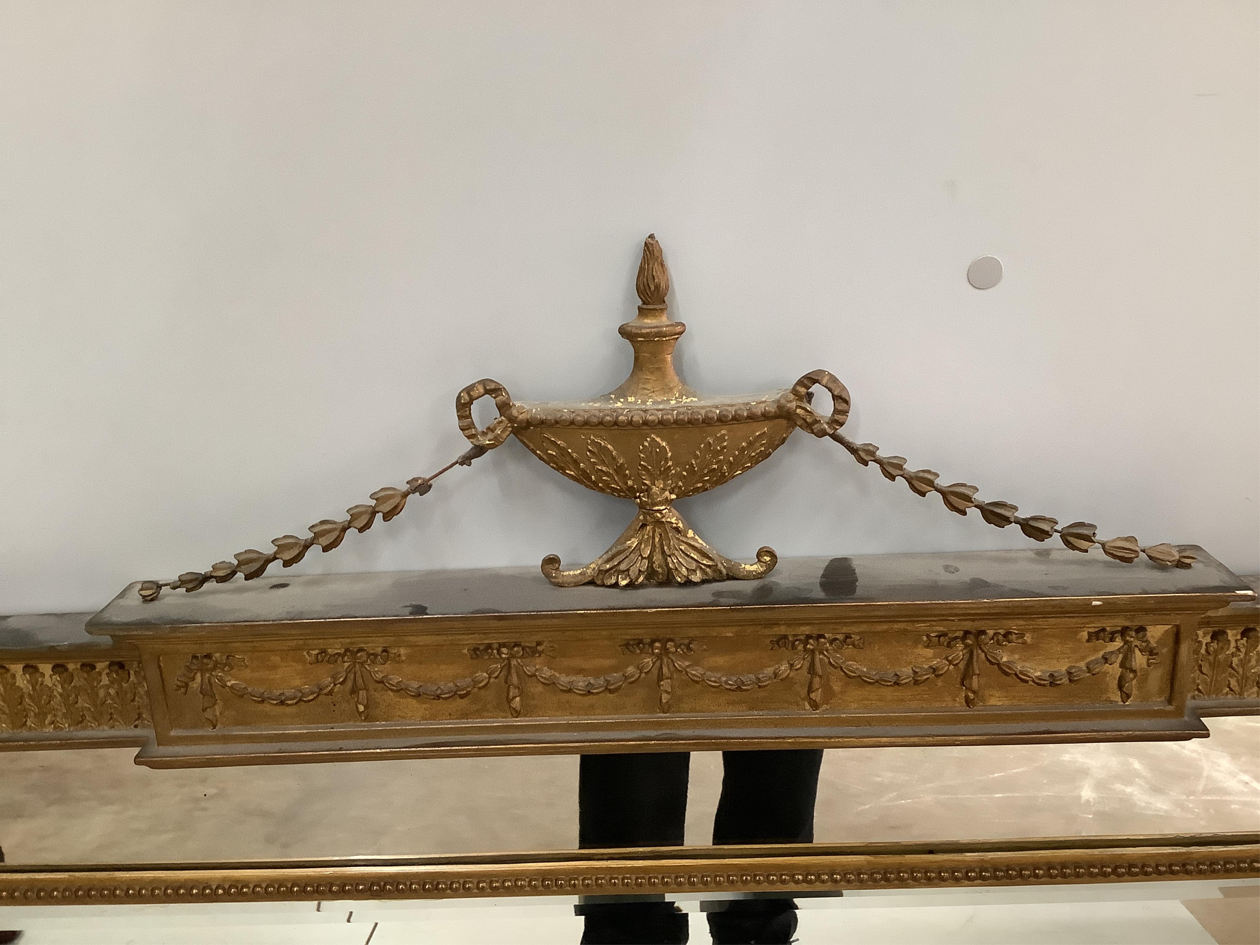 An Adam design gilt framed overmantel mirror, width 126cm, height 92cm. Condition - fair